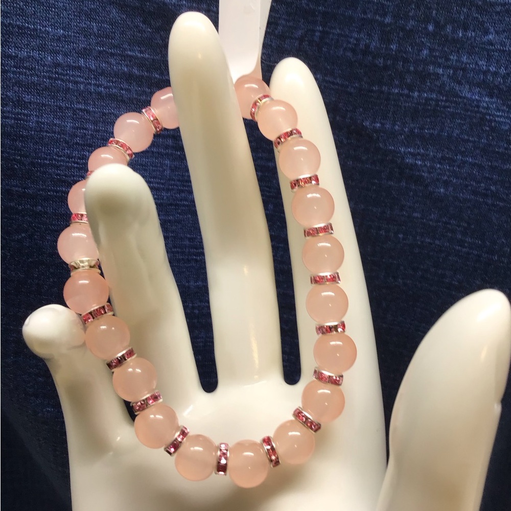 Elegant Pink Beaded Bracelet with Silver Highlights